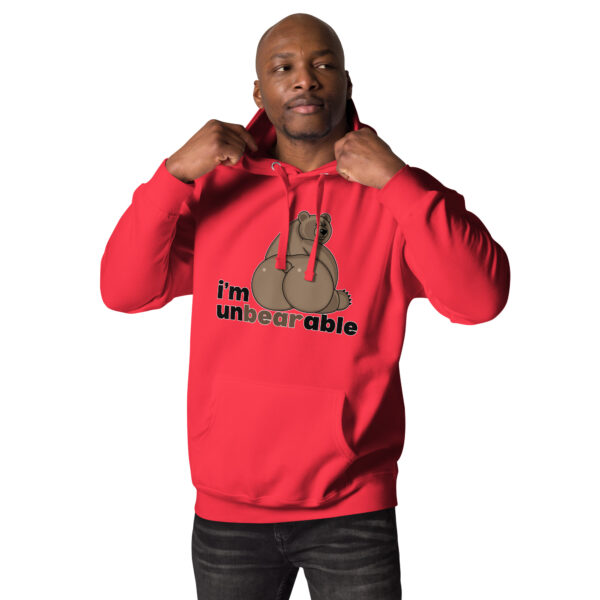 A person is wearing the "i'm unbearable" hoodie, which features a bear graphic and red color.