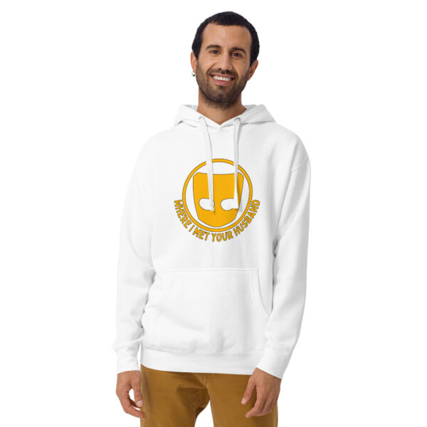 A person wearing the "Where I Met Your Husband" hoodie featuring a white design with a yellow music note logo and text.