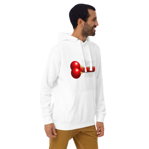 Man in a Deck My Halls Hoodie with a red balloon design, smiling, looks to the right.