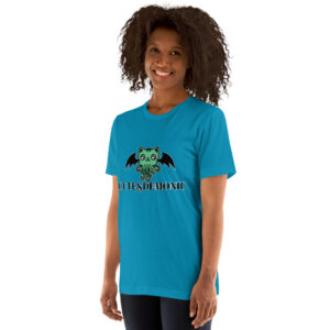 A person wearing a "Cute and Demonic" blue t-shirt showcasing a green cat graphic with wings and tentacles, along with the text "CUTE & DEMONIC.