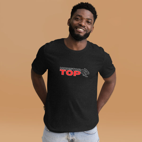 A person in a "Nonstop Top" black T-shirt featuring a bunny graphic stands against a beige background.