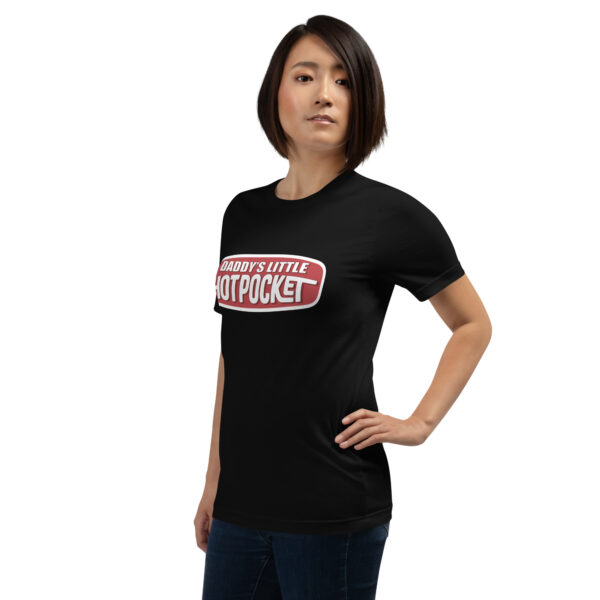 A person wearing a black t-shirt featuring the design "Daddy's Little Hotpocket" in white and red font.