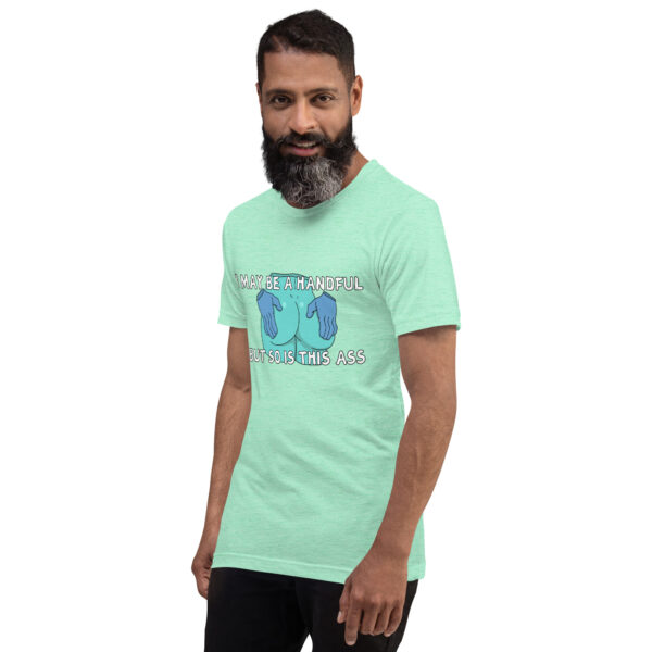 A man with a beard in a light green T-shirt showcasing the playful text and graphic design of "A Handful.