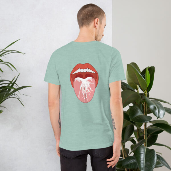 A person facing away is wearing the "Thirsty" shirt, a light green tee featuring a graphic of an open mouth with flowing liquid on the back. They are standing next to a potted plant.