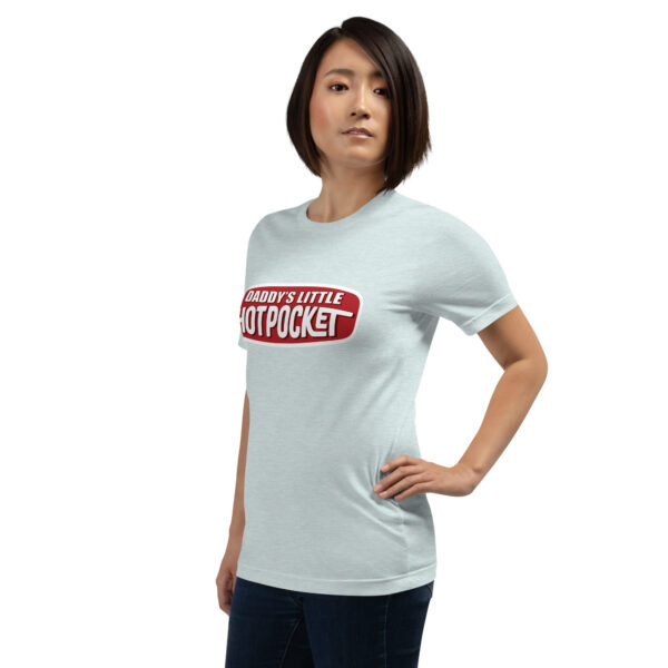 A person dressed in a gray t-shirt featuring the "Daddy's Little Hotpocket" logo, standing with one hand on their hip against a simple backdrop.