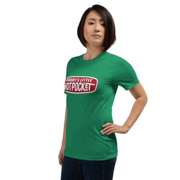 A person in a green T-shirt featuring the "Daddy's Little Hotpocket" design stands with one hand on their hip.